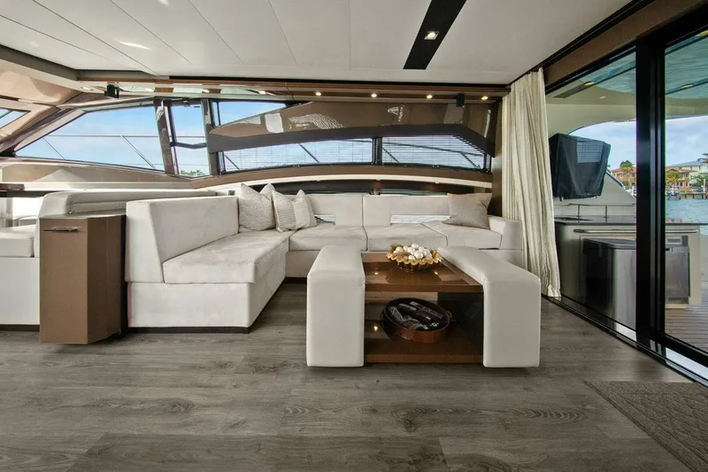 Slide: The Image of Luxurious interior of 2014 Marquis 630 Sport Yacht with elegant seating and modern decor. - 15