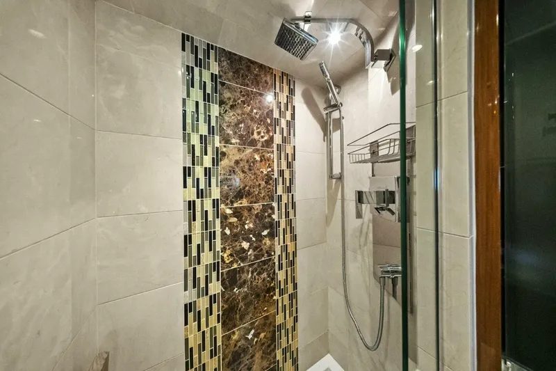 Slide: The Image of Luxurious shower in 2014 Marquis 630 Sport Yacht with elegant tile design. - 55