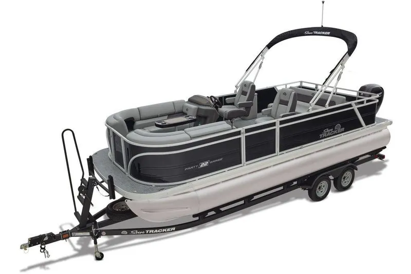 Slide: The Image of 2026 Sun Tracker Party Barge 22 RF DLX pontoon boat on trailer, side view. - 3