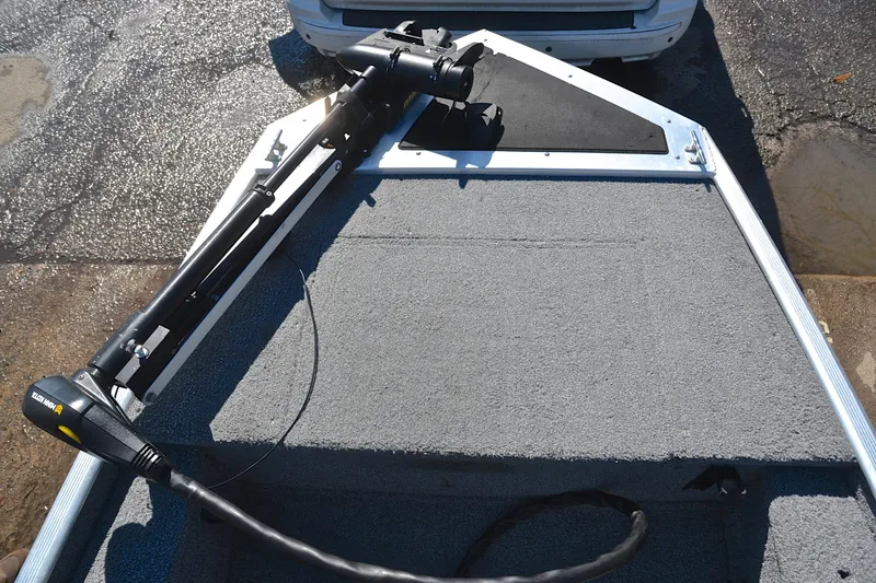 Slide: The Image of 2017 Bass Tracker Pro 16 boat deck with trolling motor. - 25