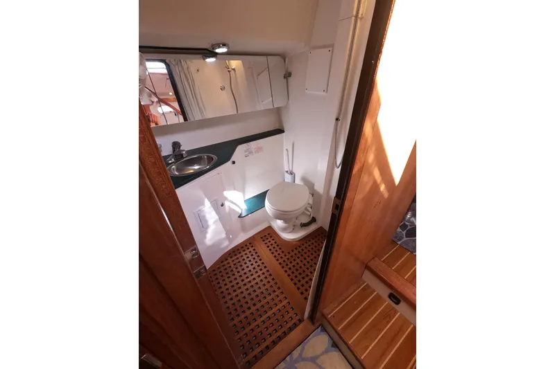 Slide: The Image of Bathroom interior of 2005 Catalina Morgan 440 yacht with wooden flooring and compact design. - 36