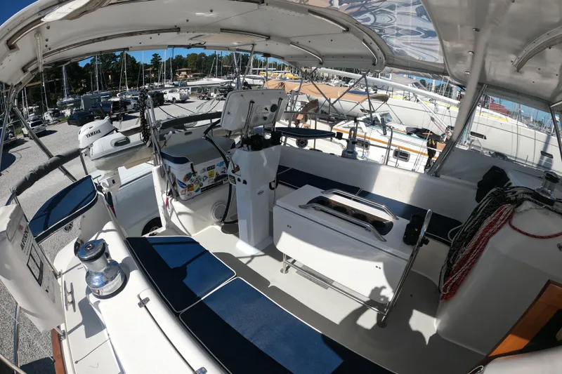 Slide: The Image of Cockpit view of 2005 Catalina Morgan 440 sailboat with blue seating and equipment. - 7