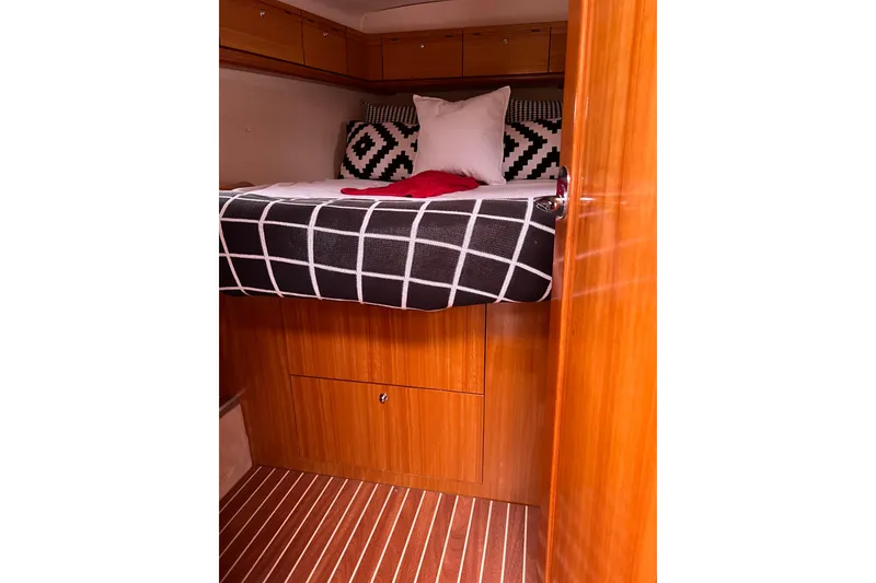 Slide: The Image of Cozy cabin interior of 2008 Bavaria 40 Vision yacht with stylish bedding. - 29