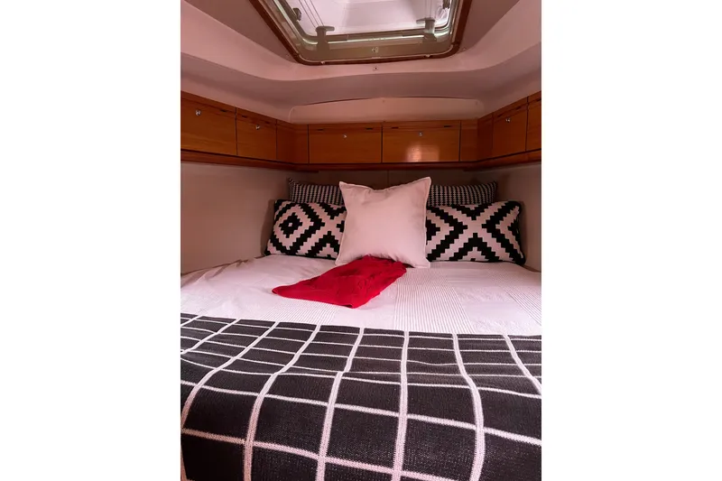 Slide: The Image of Cozy cabin interior of 2008 Bavaria 40 Vision yacht with stylish bedding. - 30