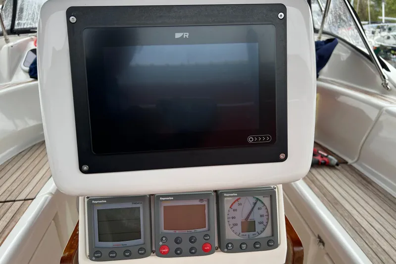 Slide: The Image of Cockpit of 2008 Bavaria 40 Vision yacht with navigation instruments and display. - 8