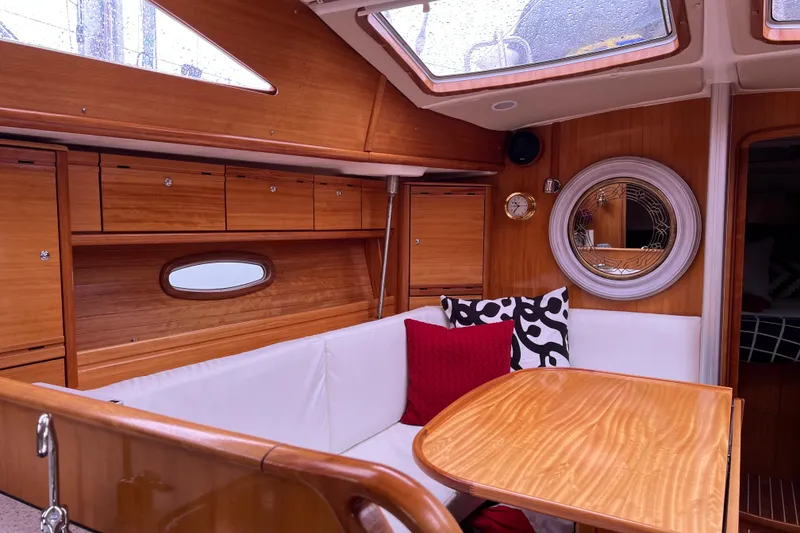 Slide: The Image of Interior of 2008 Bavaria 40 Vision yacht with wooden finish and cozy seating area. - 11