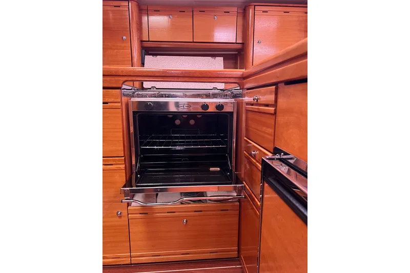Slide: The Image of Wooden yacht kitchen with open oven, Bavaria 40 Vision, 2008 model. - 22