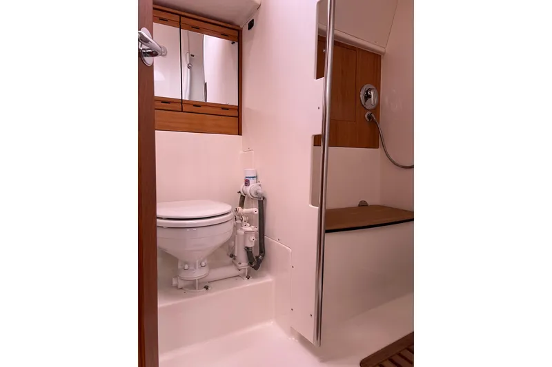 Slide: The Image of Bathroom interior of 2008 Bavaria 40 Vision yacht, featuring toilet and shower area. - 25