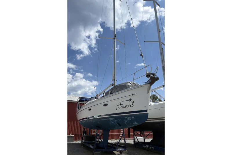 Slide: The Image of Sailboat Bavaria 40 Vision 2008 on dry dock under a cloudy sky. - 40
