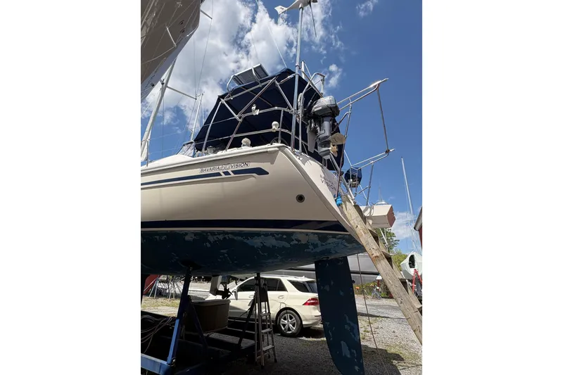 Slide: The Image of Bavaria 40 Vision 2008 sailboat on dry dock under a clear blue sky. - 42