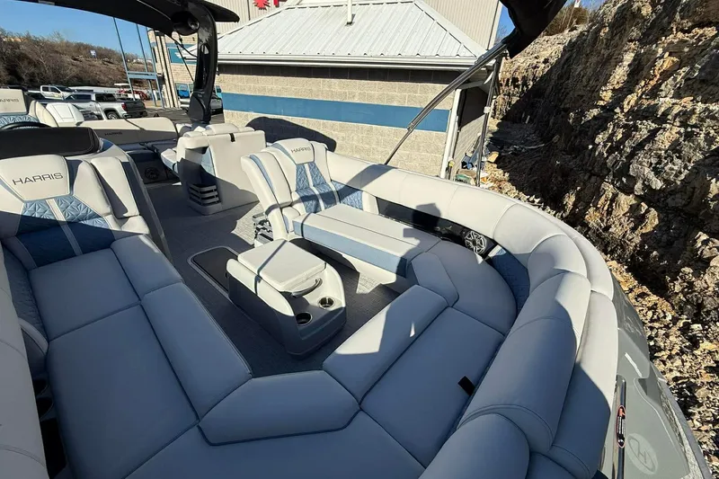 Slide: The Image of 2024 Harris Grand Mariner 250 boat interior with luxurious seating and modern design. - 10