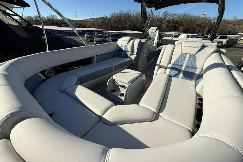 Slide: The Image of 2024 Harris Grand Mariner 250 boat interior with luxurious seating and modern design. - 11