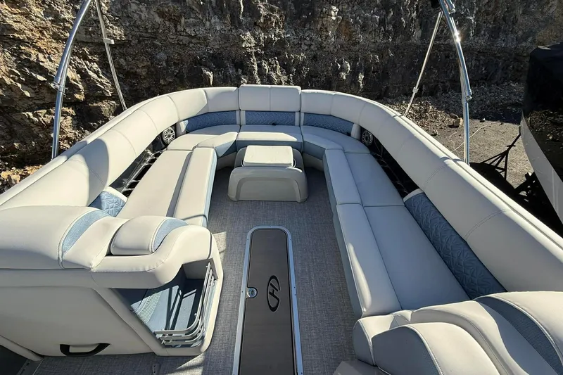 Slide: The Image of 2024 Harris Grand Mariner 250 pontoon boat with spacious seating and elegant design. - 8