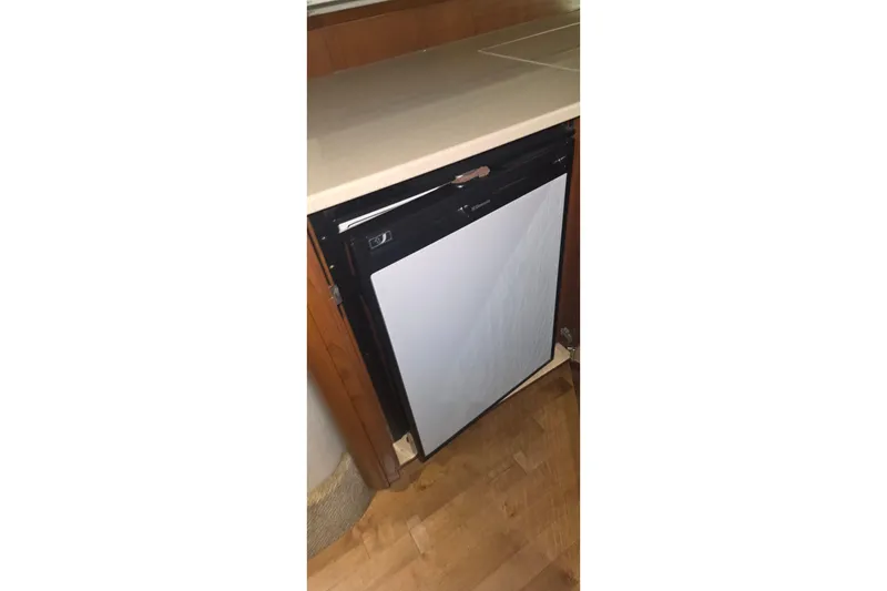 Slide: The Image of Built-in refrigerator in 2009 Sea Ray Sundancer 350 yacht kitchen area. - 17