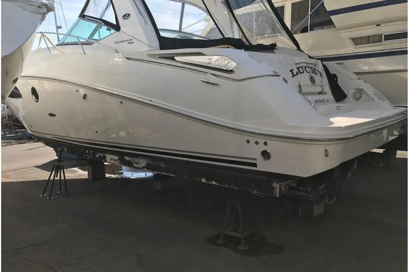Slide: The Image of 2009 Sea Ray Sundancer 350 docked on stands. - 2