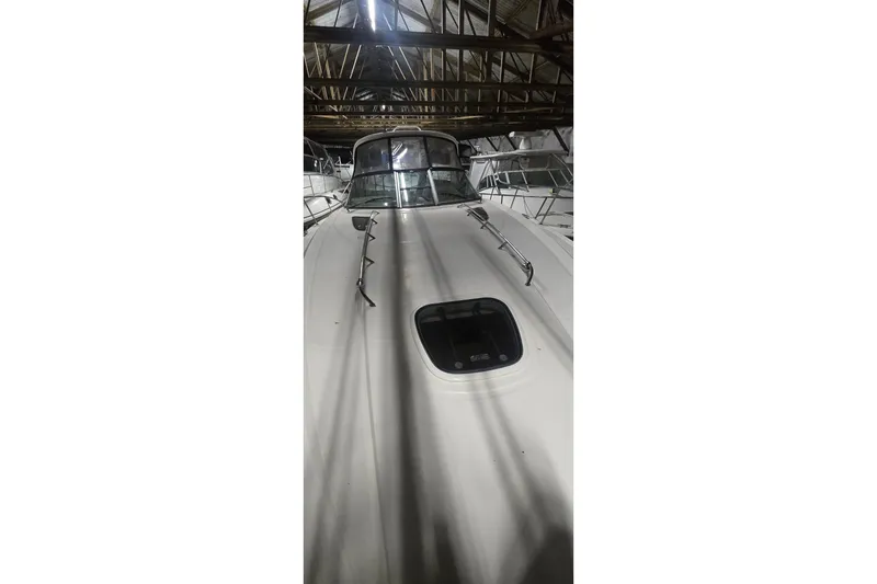 Slide: The Image of 2009 Sea Ray Sundancer 350 yacht in storage, viewed from the bow. - 4