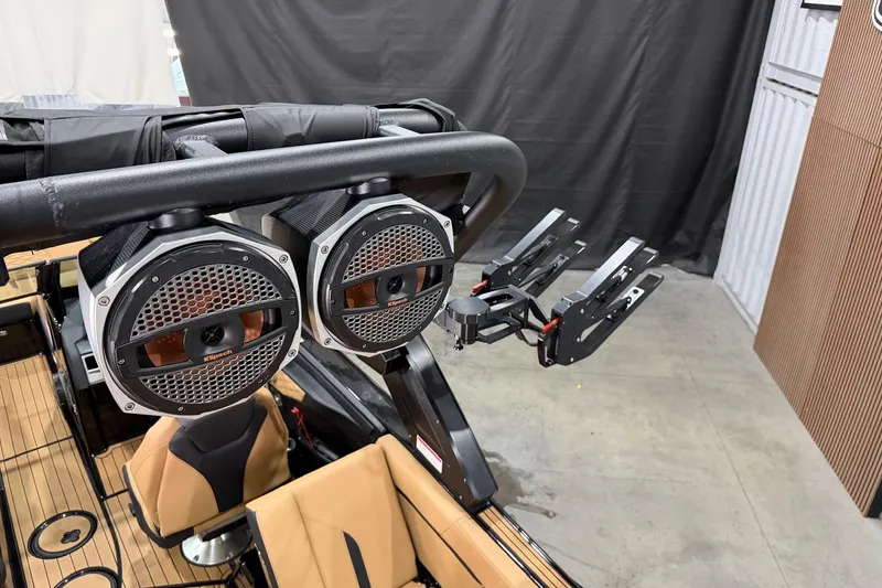 Slide: The Image of 2023 MasterCraft X24 boat with premium audio speakers and sleek interior design. - 15