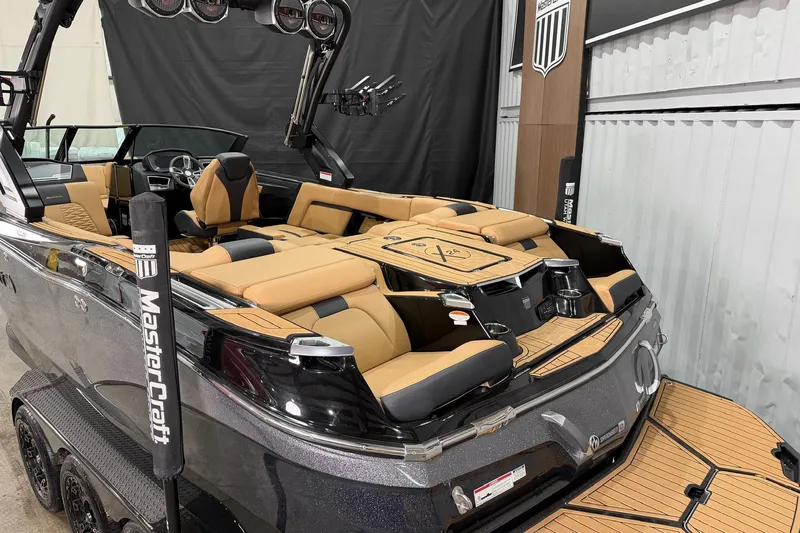 Slide: The Image of 2023 MasterCraft X24 boat interior with luxurious seating and modern design. - 5