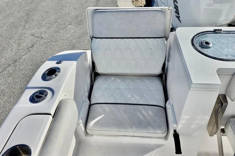 Slide: The Image of 2023 Sea Fox 328 Commander boat seating with cup holders and livewell. - 14