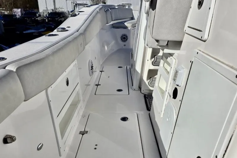 Slide: The Image of 2023 Sea Fox 328 Commander boat interior with seating and storage compartments. - 16