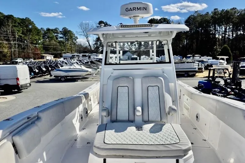Slide: The Image of 2023 Sea Fox 328 Commander boat with Garmin equipment, docked in a marina. - 4