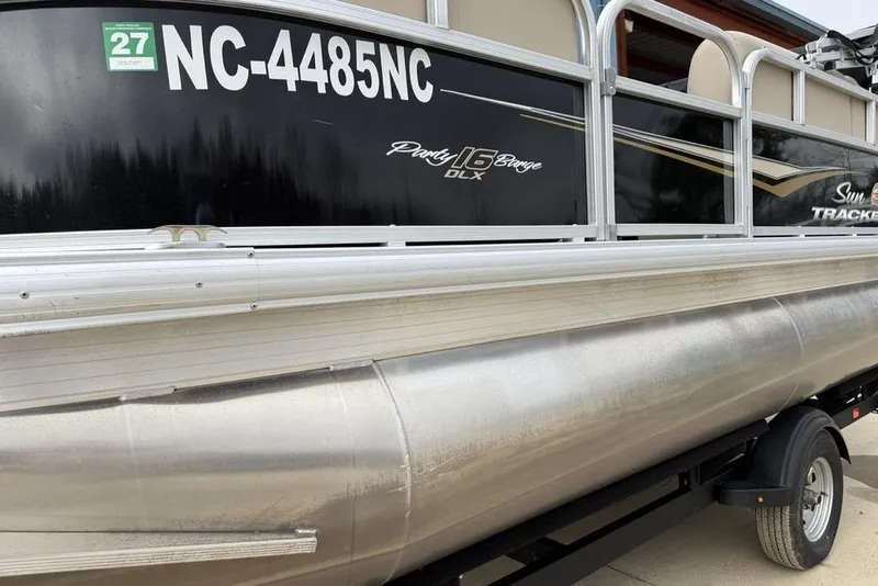 Slide: The Image of 2024 Sun Tracker Party Barge 16 DLX pontoon boat with registration NC-4485NC. - 2