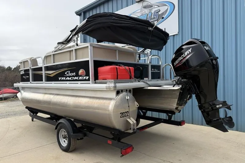 Slide: The Image of 2024 Sun Tracker Party Barge 16 DLX pontoon boat with Mercury outboard motor. - 5