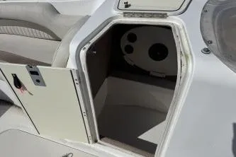 Slide: The Image of 2012 NauticStar 210DC Sport Deck boat interior storage compartment. - 10