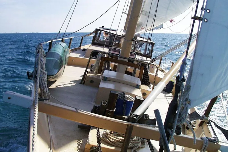 Slide: The Image of Sailing on a 2002 Parker Marine Enterprises Lorcha 50 in open sea. - 17