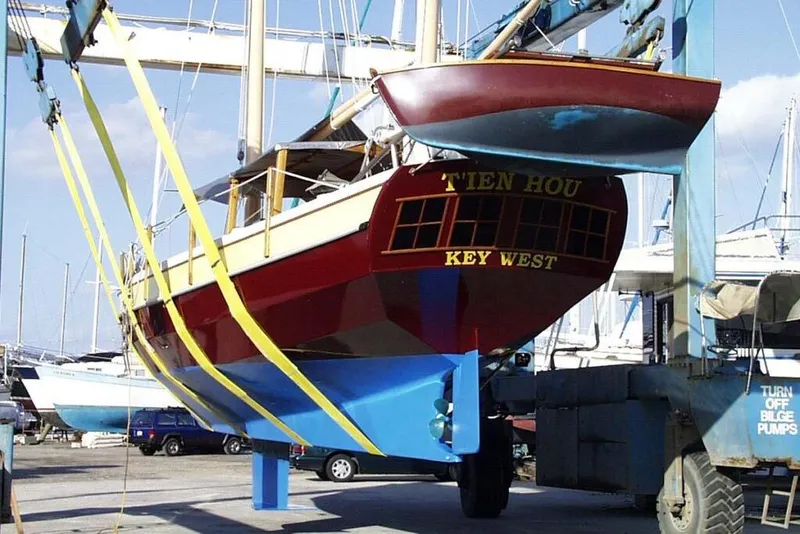 Slide: The Image of Parker Marine Enterprises Lorcha 50 sailboat, 2002, in dry dock at Key West marina. - 21