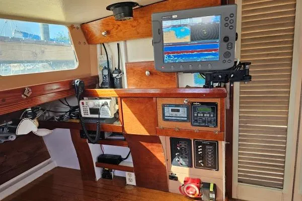 Slide: The Image of Navigation equipment on 2002 Parker Marine Enterprises Lorcha 50 sailboat. - 7