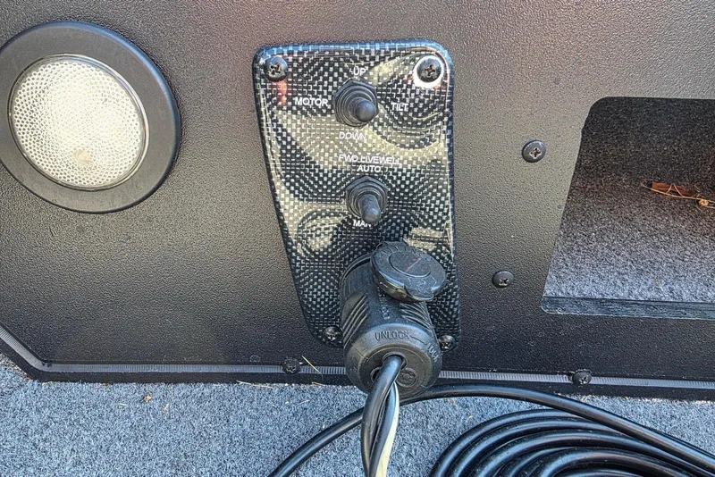 Slide: The Image of Control panel on a 2019 Tracker Targa V-18 WT boat with wiring and light. - 18