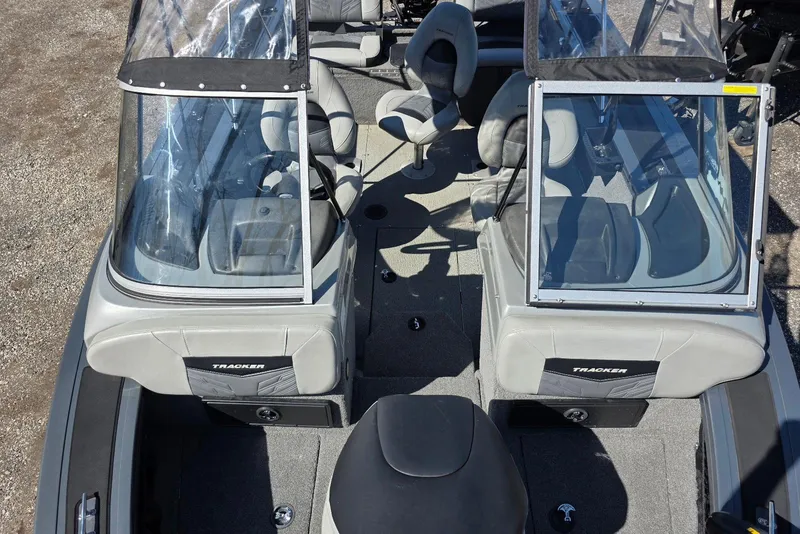 Slide: The Image of 2019 Tracker Targa V-18 WT boat interior with seating and windshield. - 20