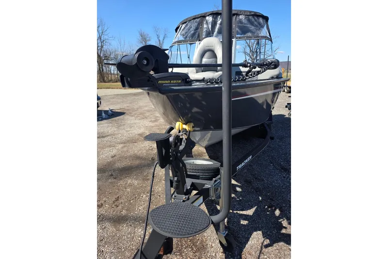 Slide: The Image of 2019 Tracker Targa V-18 WT boat on trailer, featuring Minn Kota motor. - 3