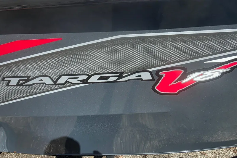 Slide: The Image of 2019 Tracker Targa V-18 WT logo with red and gray design elements. - 4