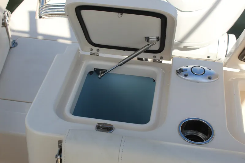 Slide: The Image of 2023 Grady-White Freedom 235 boat interior with sink and Yeti cooler. - 26