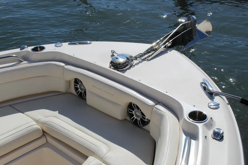 Slide: The Image of 2023 Grady-White Freedom 235 boat interior with white seating and sleek design. - 6