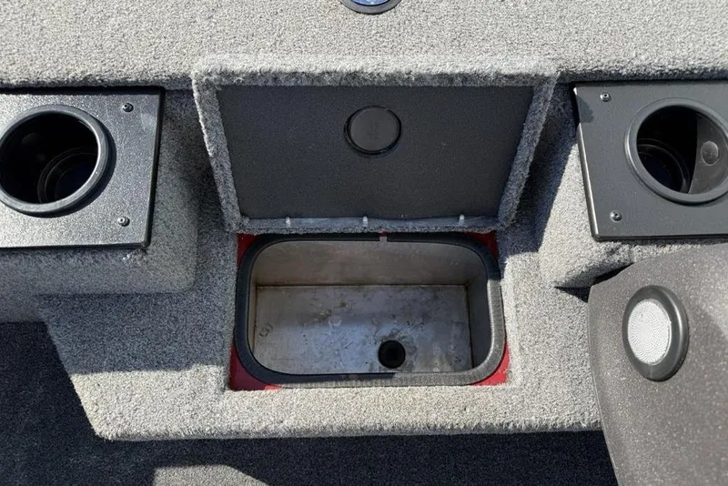 Slide: The Image of 2022 Tracker Pro Team 175 TXW Tournament Edition boat interior with storage compartment. - 11