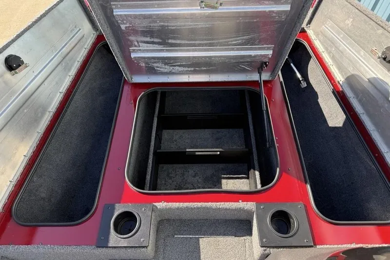 Slide: The Image of 2022 Tracker Pro Team 175 TXW Tournament Edition boat storage compartments open. - 13