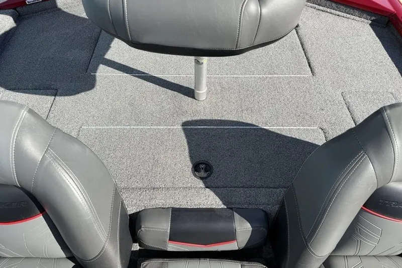 Slide: The Image of 2022 Tracker Pro Team 175 TXW Tournament Edition boat interior with gray seating and carpeted deck. - 18