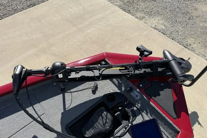 Slide: The Image of 2022 Tracker Pro Team 175 TXW Tournament Edition boat with trolling motor setup. - 6