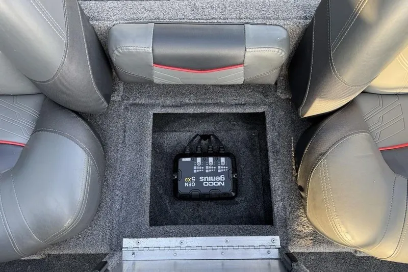 Slide: The Image of 2022 Tracker Pro Team 175 TXW boat interior with NOCO Genius battery charger. - 15