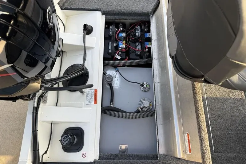 Slide: The Image of 2022 Tracker Pro Team 175 TXW boat engine and battery compartment view. - 23