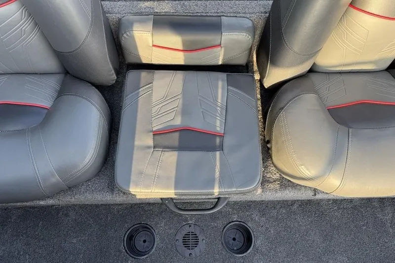 Slide: The Image of 2022 Tracker Pro Team 175 TXW boat seats with gray upholstery and red accents. - 19