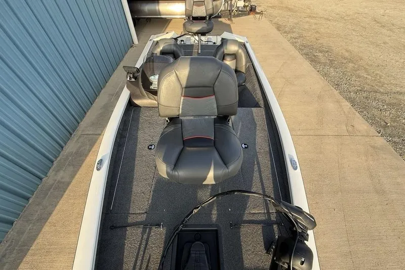 Slide: The Image of 2022 Tracker Pro Team 175 TXW boat with dual seats and fishing gear. - 22