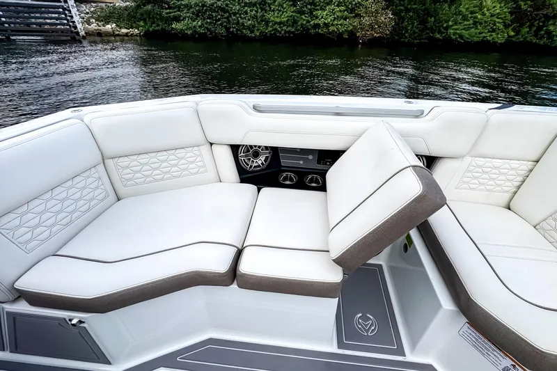Slide: The Image of Luxurious seating on 2026 Ingenity EL boat, featuring elegant white upholstery and modern design. - 16