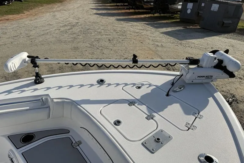 Slide: The Image of 2022 Sportsman Masters 247OE Bay Boat with Minn Kota trolling motor on deck. - 10