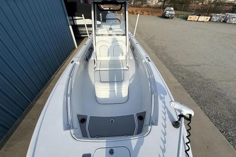 Slide: The Image of 2022 Sportsman Masters 247OE Bay Boat, sleek design, spacious deck, modern features. - 27