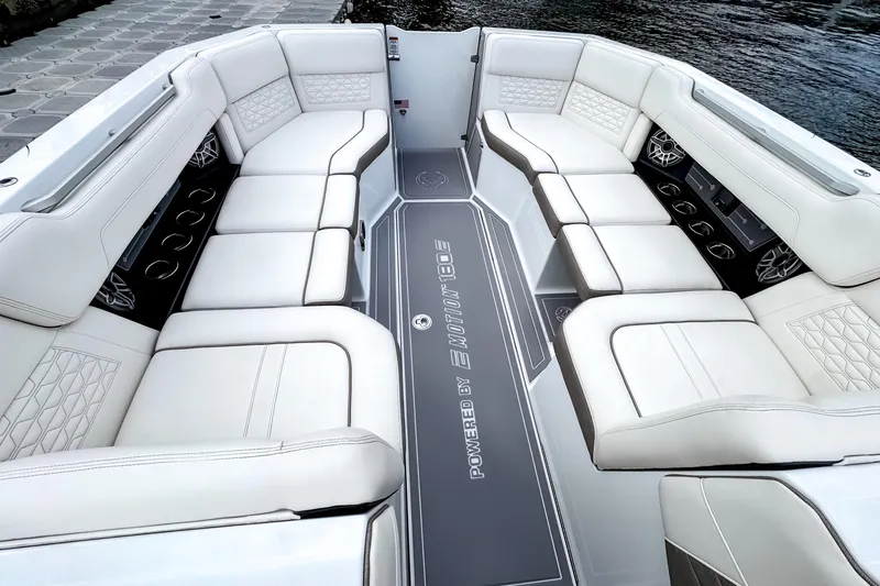 Slide: The Image of Luxurious seating on 2026 Ingenity EL boat, featuring elegant white upholstery and modern design. - 14