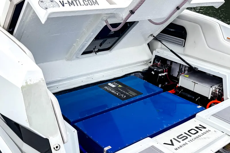 Slide: The Image of 2026 Ingenity EL electric boat engine compartment with Vision Marine Technologies components. - 13